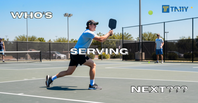 pickleball player serving