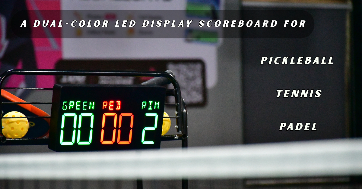 Tally portable digital scoreboard displaying pickleball scores on a multi-use outdoor court fence.